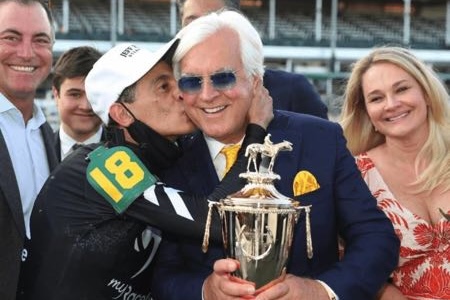 Bob Baffert with jockey and trophy